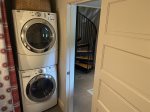 Stackable washer and dryer on lower level